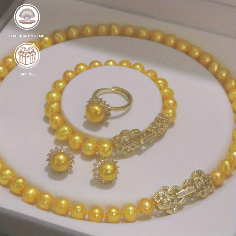 Luxurious 4-piece Jewelry Set in Beautiful Golden Tones featuring Genuine Lustrous Pearl Necklace, Bracelet, Earrings, and Ring - Exquisitely Handcrafted with High-Quality Stones for Everyday Wear or Special Occasions - Perfect for Gifting, Comes with a