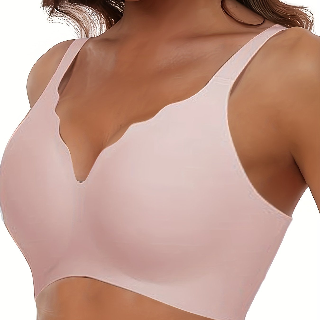 Seamless wireless push-up bra with deep V-neck and scalloped design for comfortable support