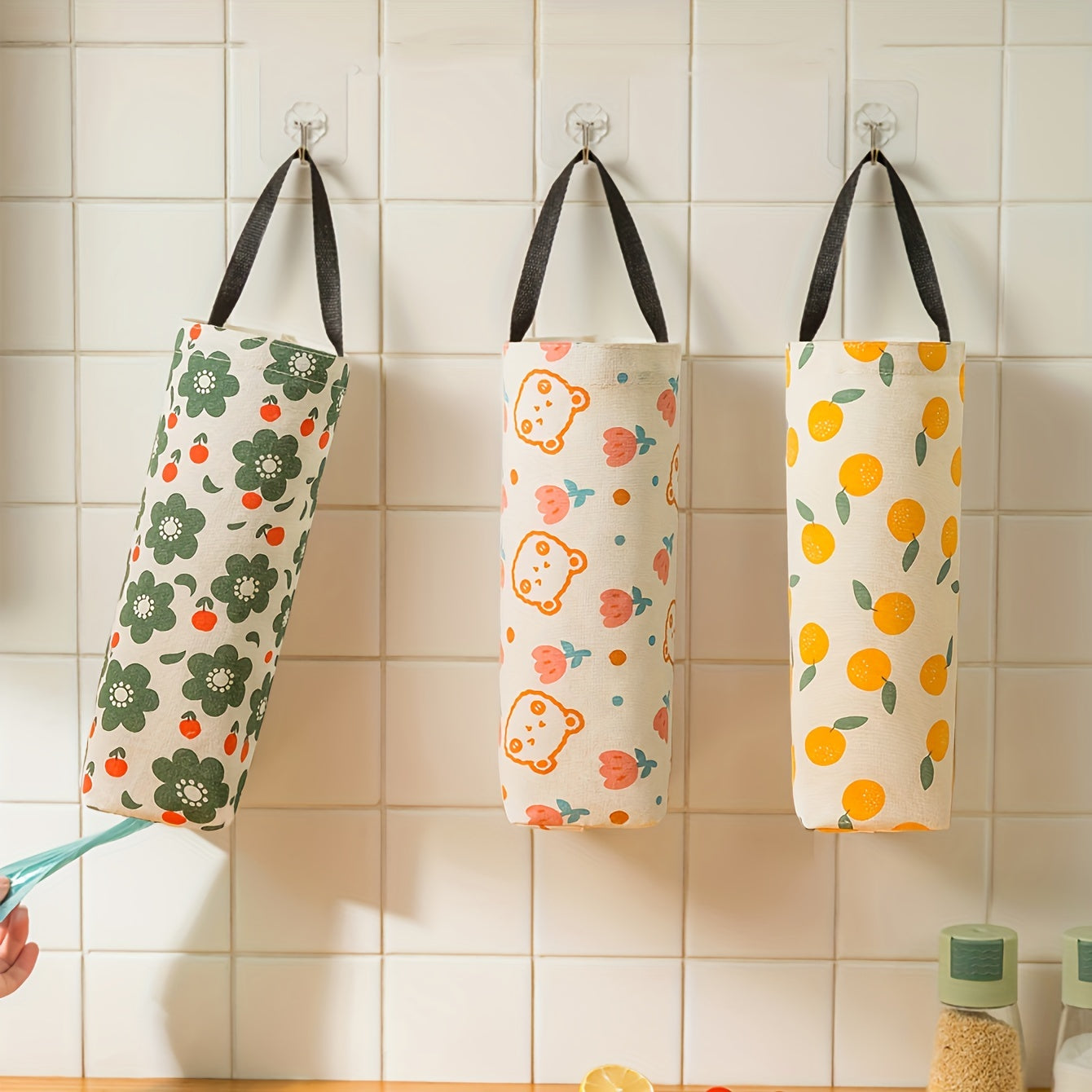 Organize your kitchen with our wall-mounted garbage bag holder - the perfect space-saving solution for keeping plastic bags and other items tidy and accessible.