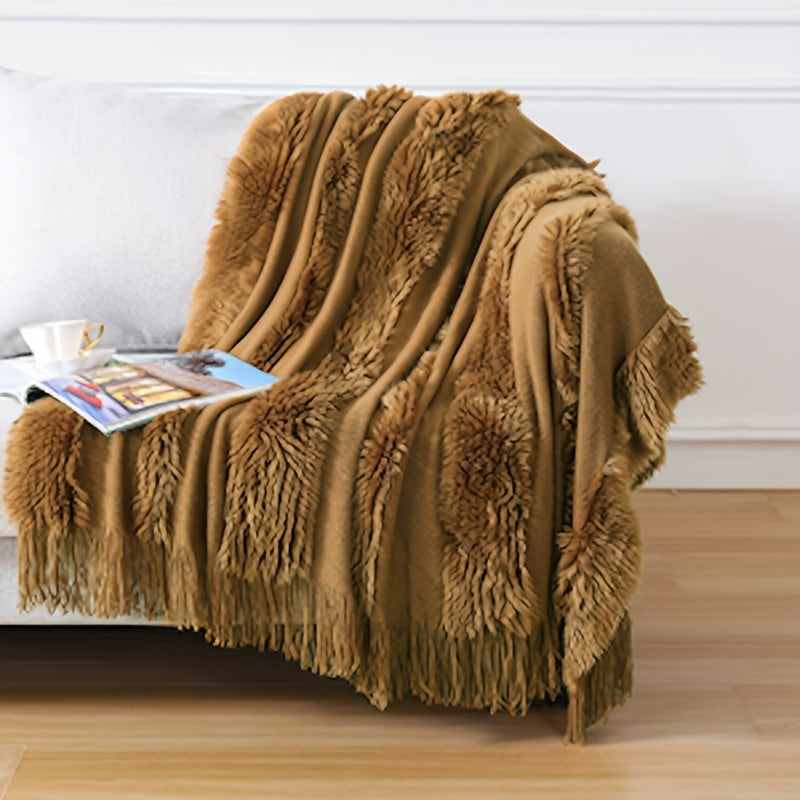 Stay cozy with this contemporary acrylic chunky knit throw blanket featuring tassels. With its solid pattern, lightweight plush texture, and machine washable design, this all-season throw is perfect for adding a touch of style and comfort to your couch