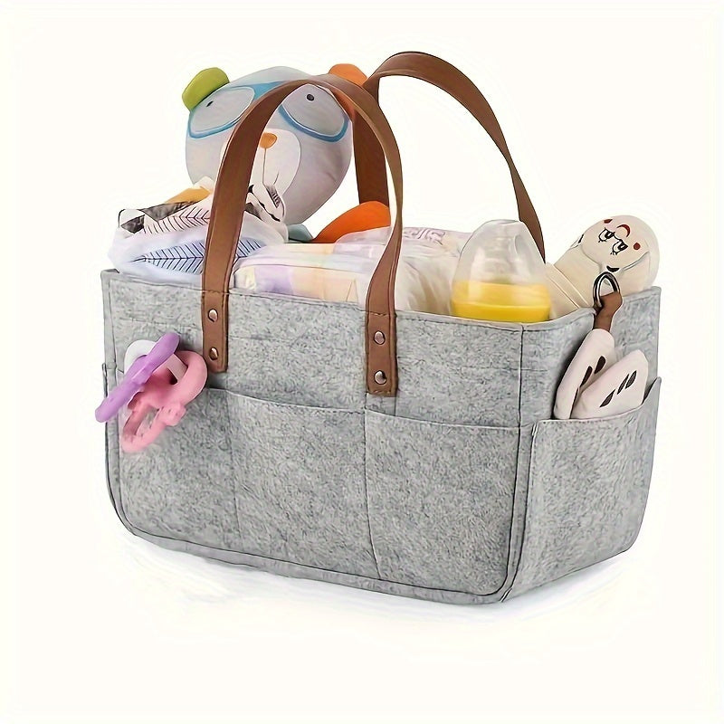 Portable and versatile Grey Patchwork Felt Diaper Caddy with convenient handles for organizing diapers. No electricity required with a sustainable wood-free design.