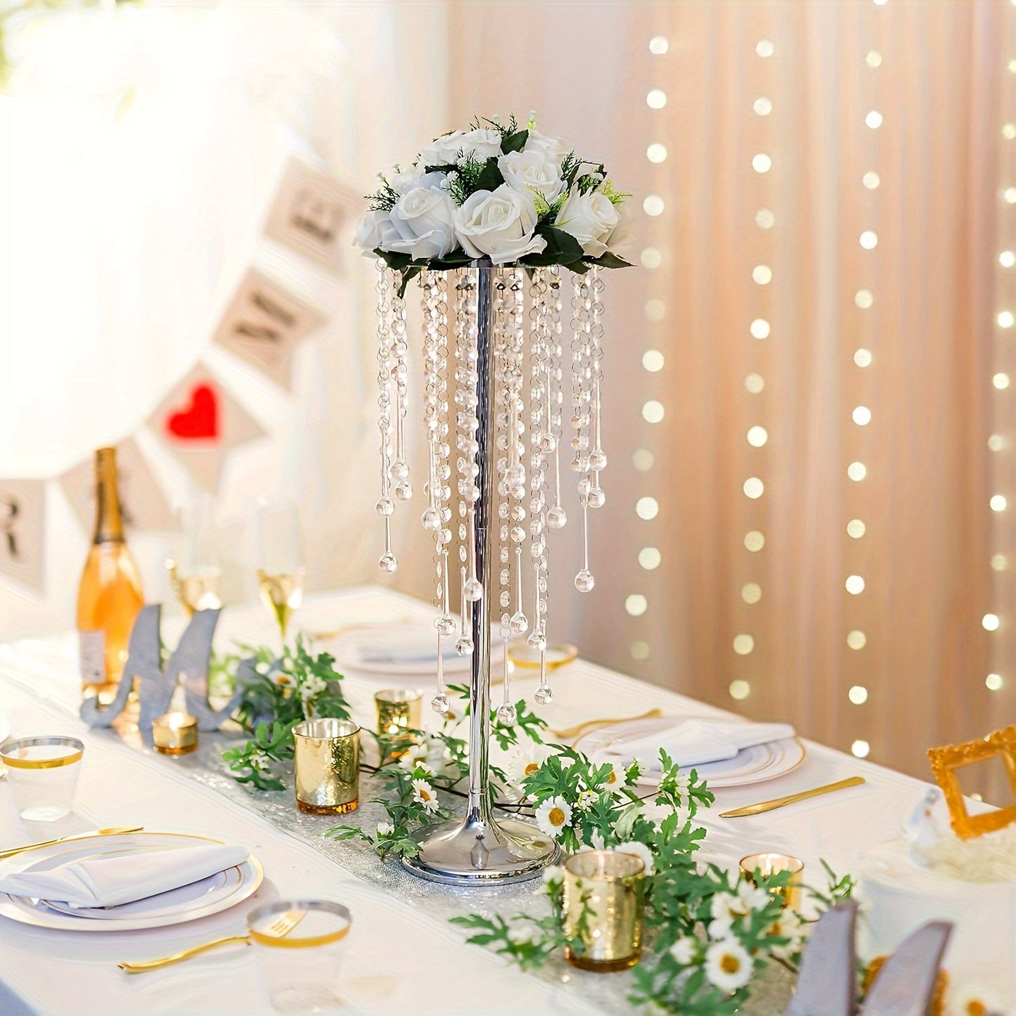 2 crystal flower stands for wedding centerpieces, metal holders for tabletop flower arrangements at reception ceremonies.