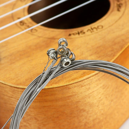 6-piece set of electric guitar strings made of nickel-plated high carbon steel. Suitable for beginners, replacement, and practice. Compatible with various electric guitar music styles.