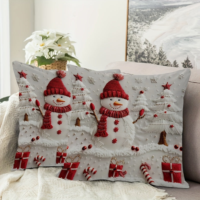 Double-sided Christmas snowman and tree design throw pillow cover made from modern polyester. Features zipper closure, machine washable fabric, and number print. Perfect for adding holiday charm to any room.