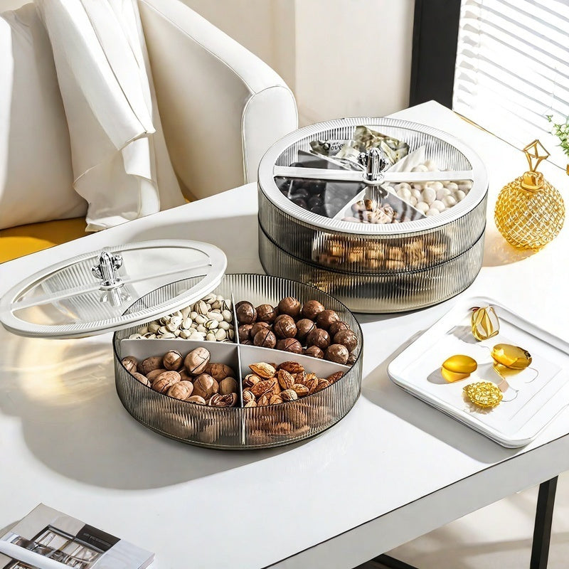 Airtight snack tray with lid for storing nuts and dried fruits in a round plastic container.