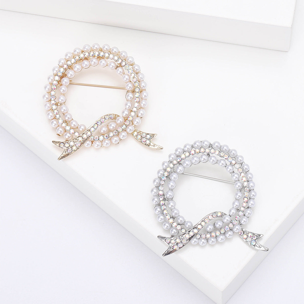 Luxurious and elegant rhinestone brooch pin featuring a unique irregular shape design, inspired by Korean fashion aesthetics. Perfect accessory for women who appreciate novelty and sophistication.