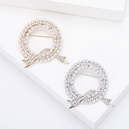 Luxurious and elegant rhinestone brooch pin featuring a unique irregular shape design, inspired by Korean fashion aesthetics. Perfect accessory for women who appreciate novelty and sophistication.