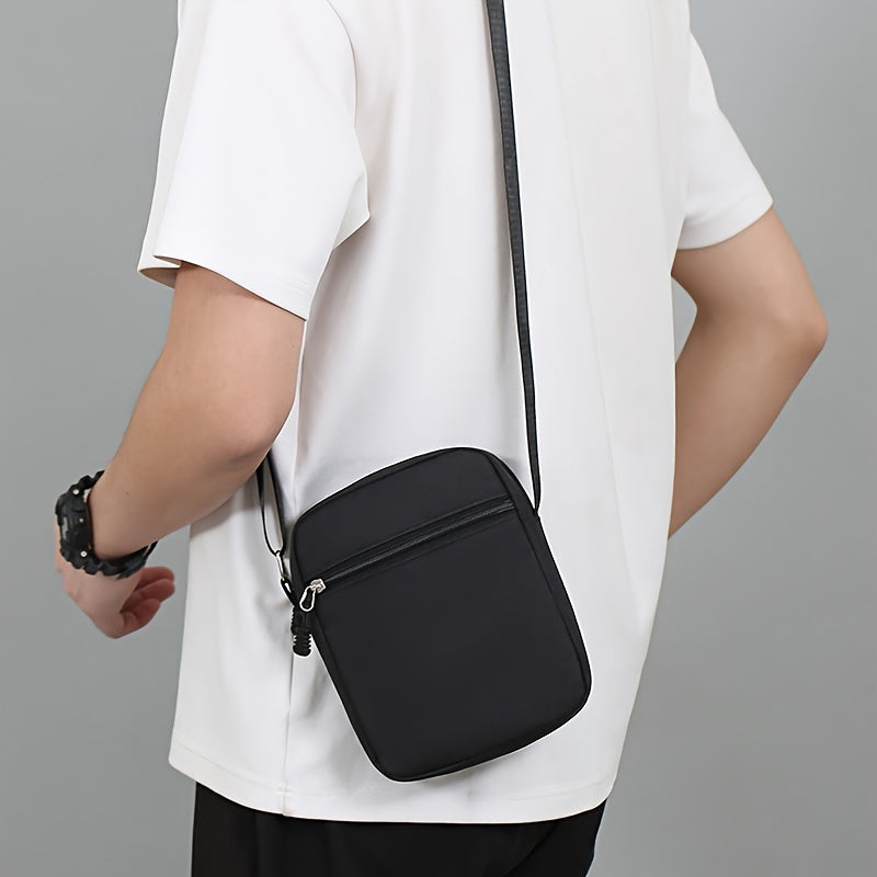 Black Oxford cloth shoulder bag with adjustable strap for daily use, hand wash or dry clean recommended.