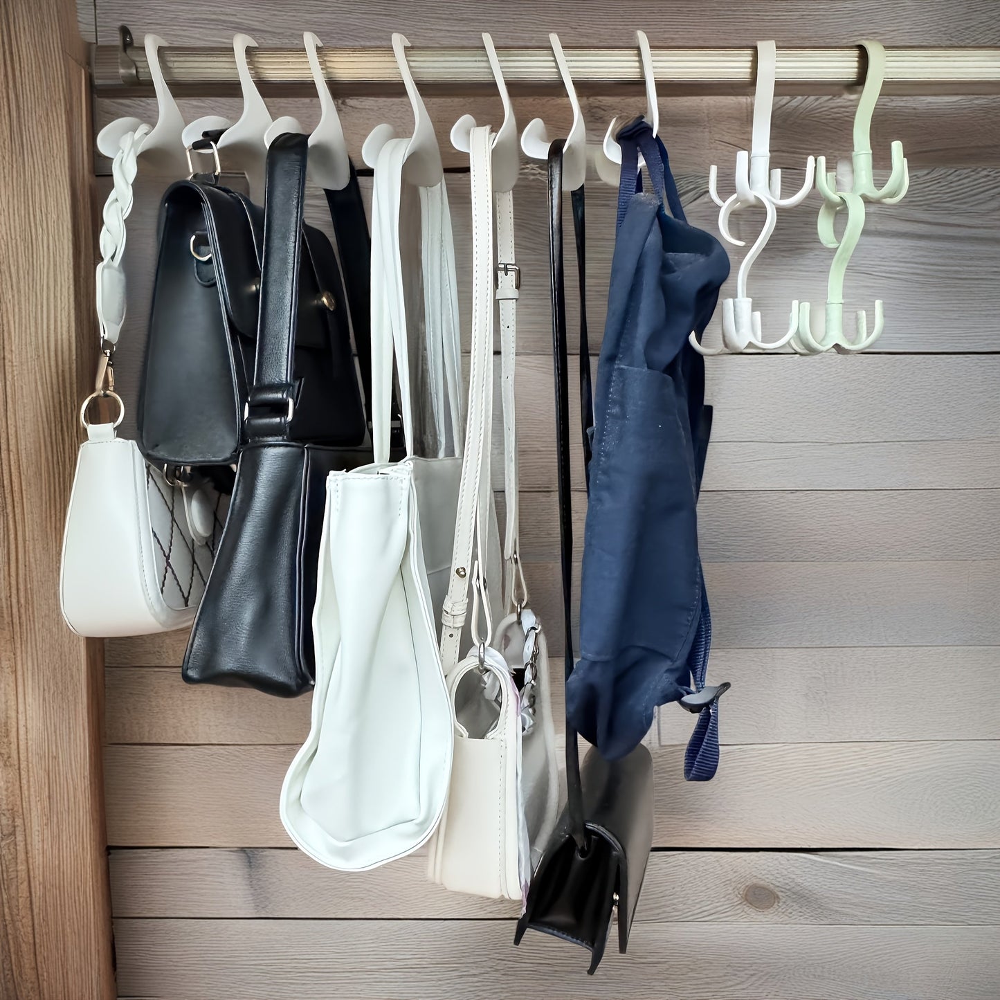 This multifunctional wardrobe set includes 14 pieces of widened design hooks, perfect for storing bags and clothes. The rotating hooks can be used for various purposes, making it a versatile addition to your storage solutions.