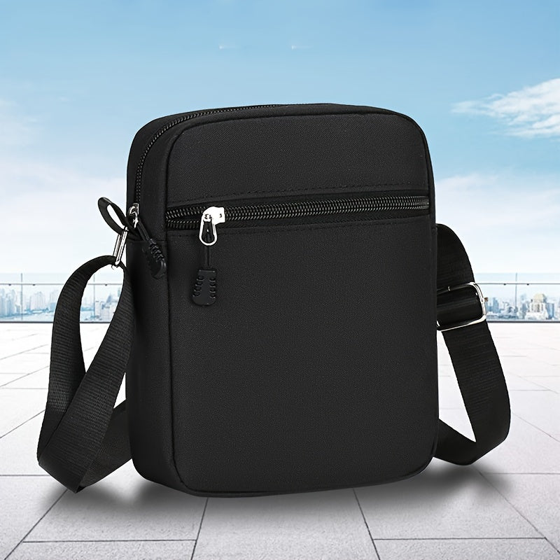 Black Oxford cloth shoulder bag with adjustable strap for daily use, hand wash or dry clean recommended.