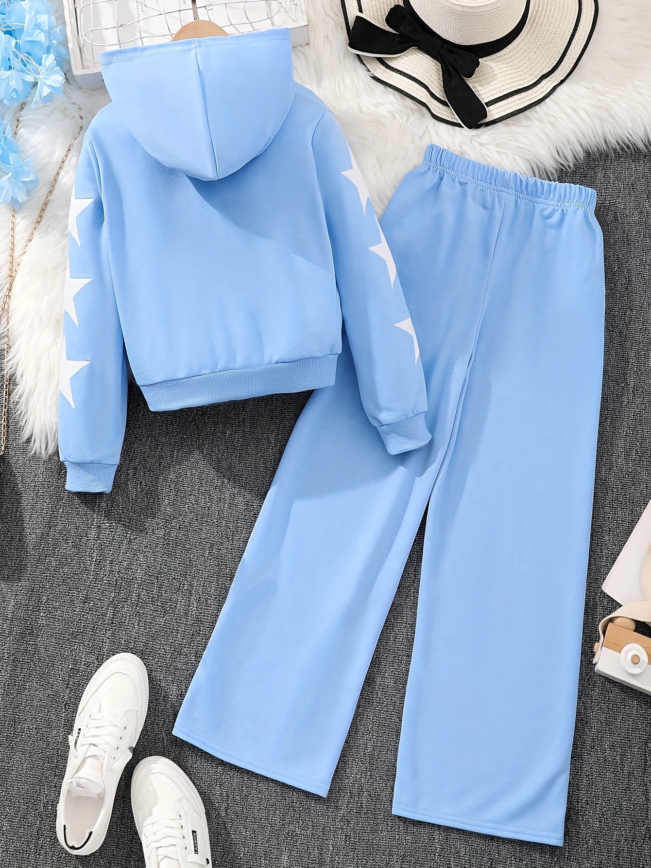 Polyester zip-up hoodie and pants set for girls with star pattern. Machine washable for easy care. Ideal for casual fall/winter outfits and outdoor activities.