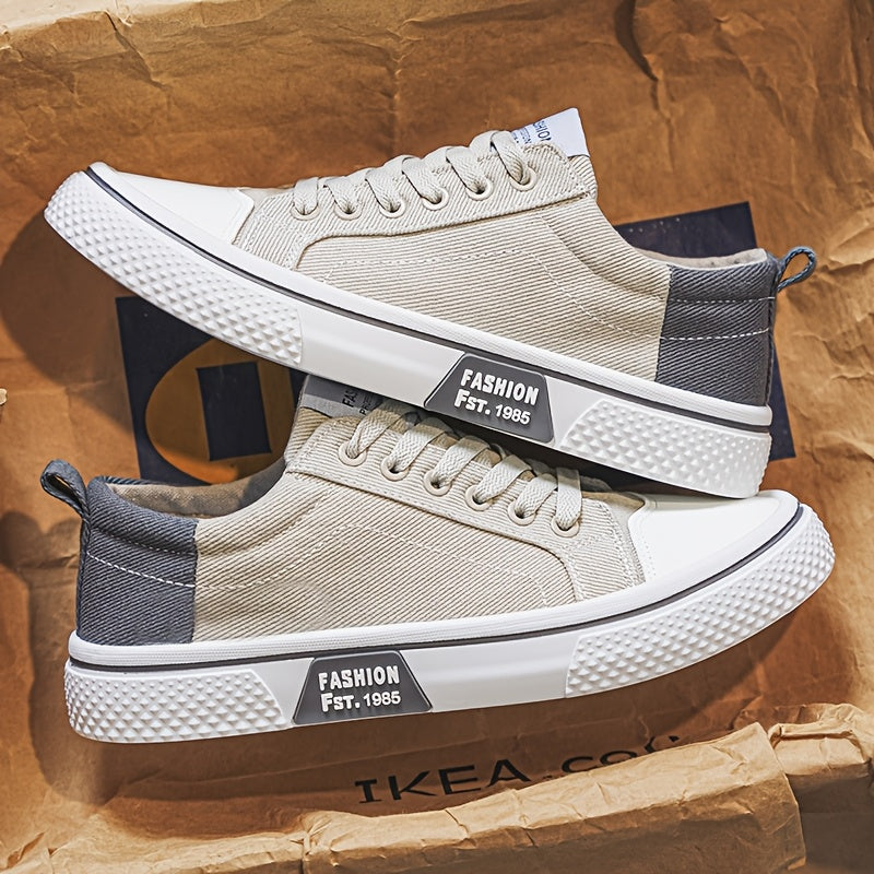 Stylish men's canvas sneakers with two-tone design and breathable fabric lining, ideal for casual wear.