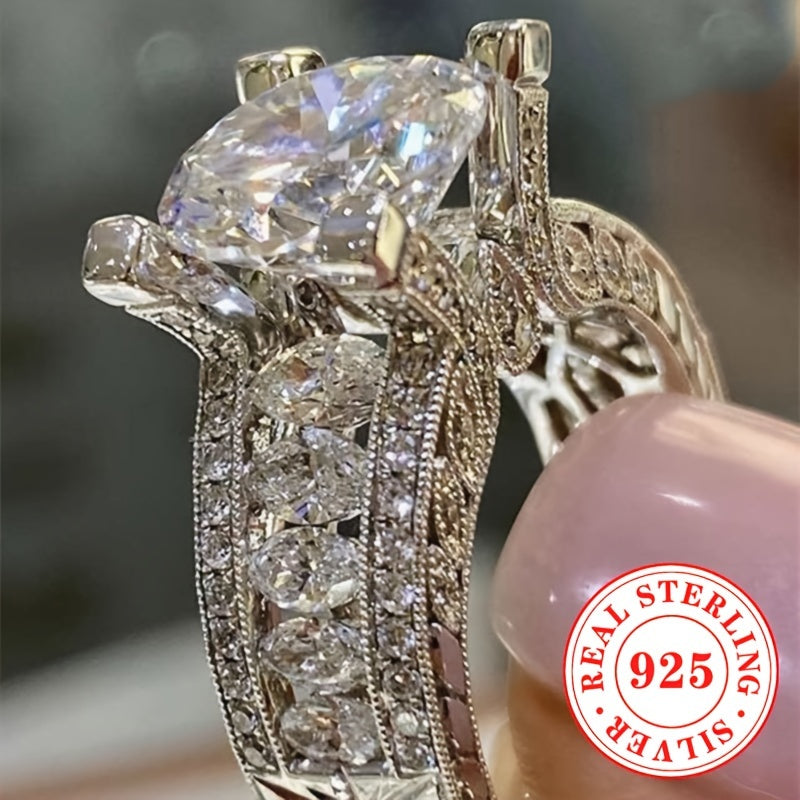 Luxurious Sterling Silver 925 Wedding Ring adorned with Synthetic Cubic Zirconia, exuding a touch of elegance and sophistication. This stunning Bridal Band in a Luxury Vacation Style features a Round-Cut April Birthstone, adding a sparkling touch to your