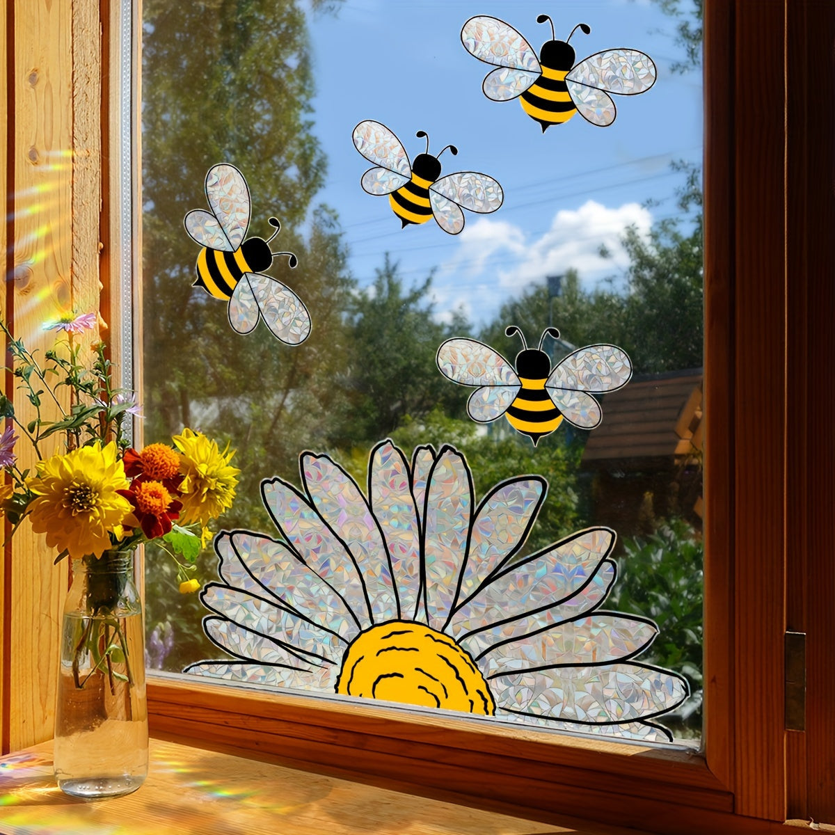 Bring a touch of spring to your home with this Sunflower & Bee Window Cling! Measuring 30.48cm x 40.64cm, this reusable electrostatic glass decal features double-sided colorful designs that make perfect home decor accents.