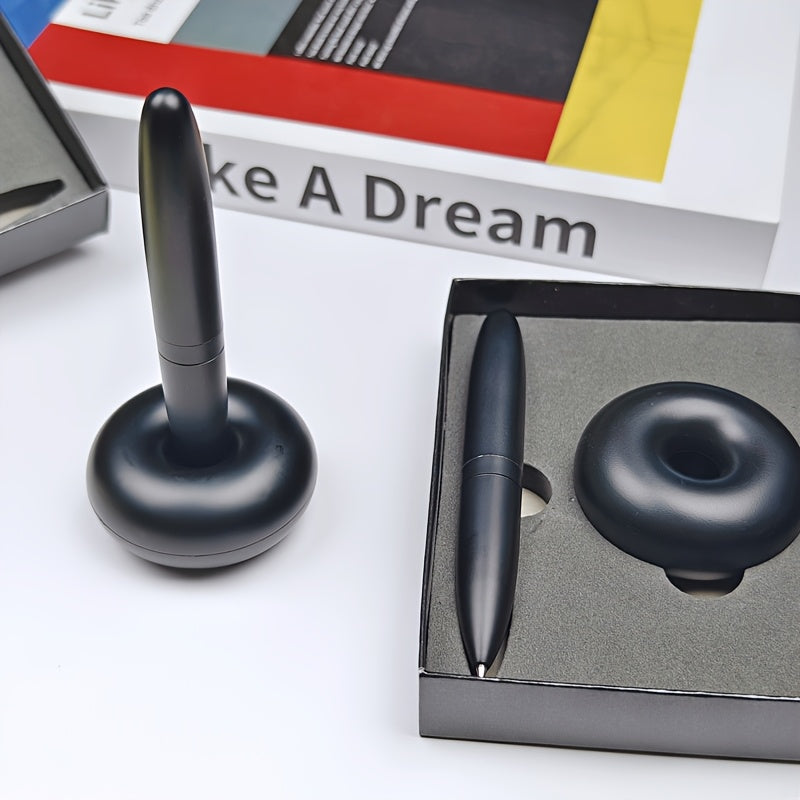 Magnetic levitation round ballpoint pen for men's gift with metal and plastic pen holder.