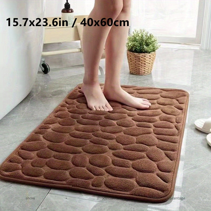 Cobblestone Embossed Bathroom Bath Mat - The Perfect Addition to Your Shower Room! This machine washable bath rug is designed for rapid water absorption, with a non-slip backing for added safety. Keep your bathroom floors dry and comfortable with this