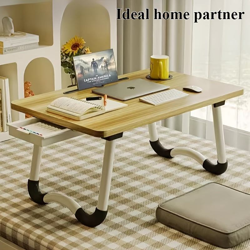 Foldable laptop desk with sturdy material and spacious desktop, suitable for student dorms.