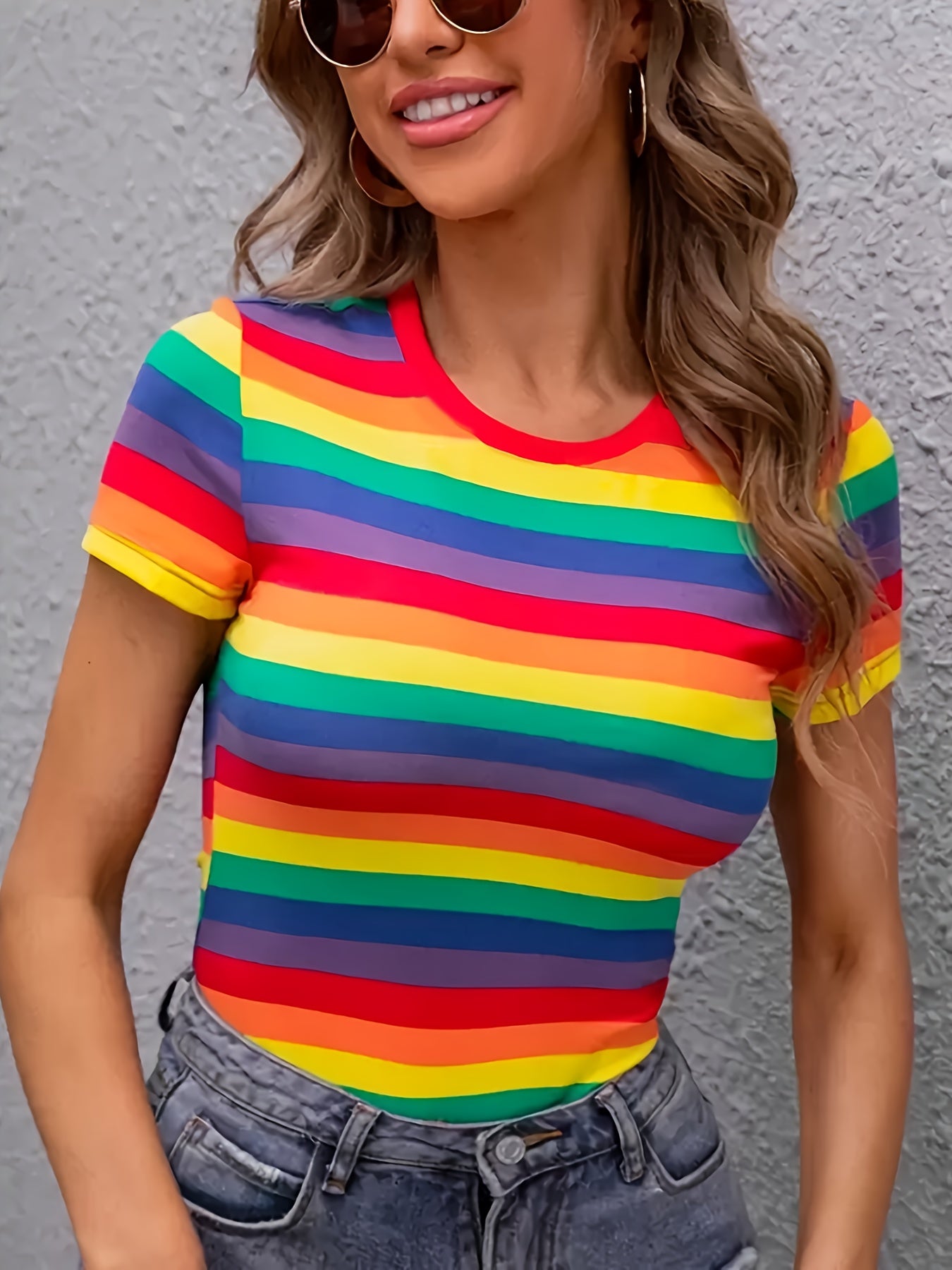 Machine washable women's rainbow stripe print t-shirt with color block detail.