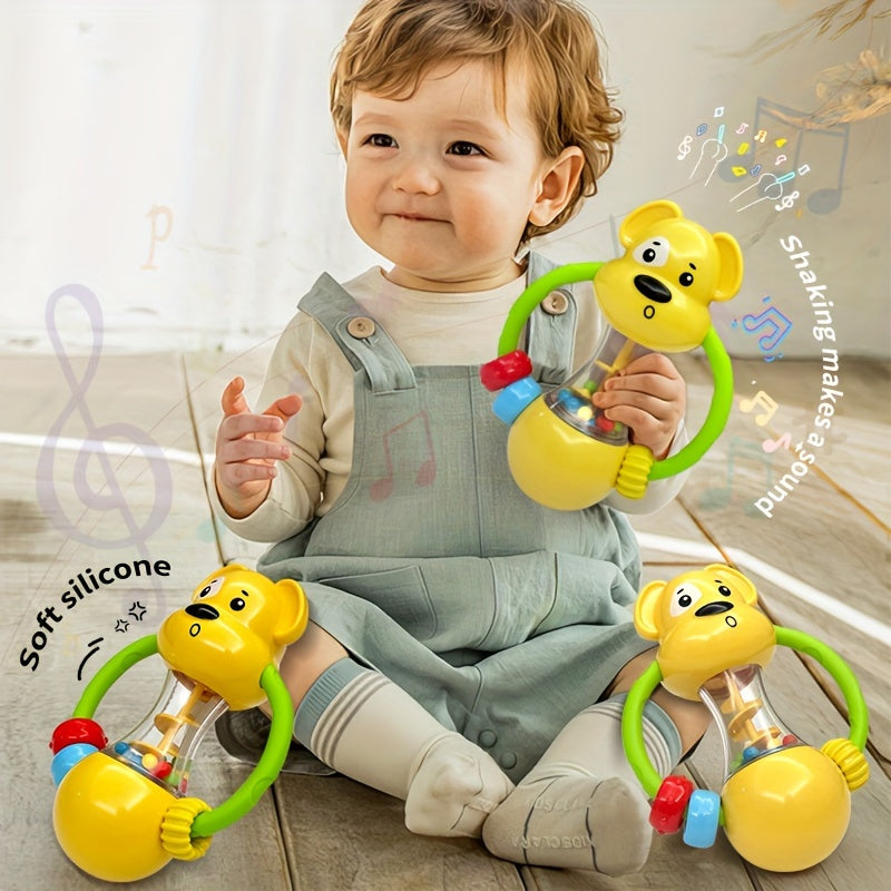 Soft rubber rattle with a puppy theme for young children, featuring a comfortable grip design and available in various colors. A fun early learning toy for little ones.