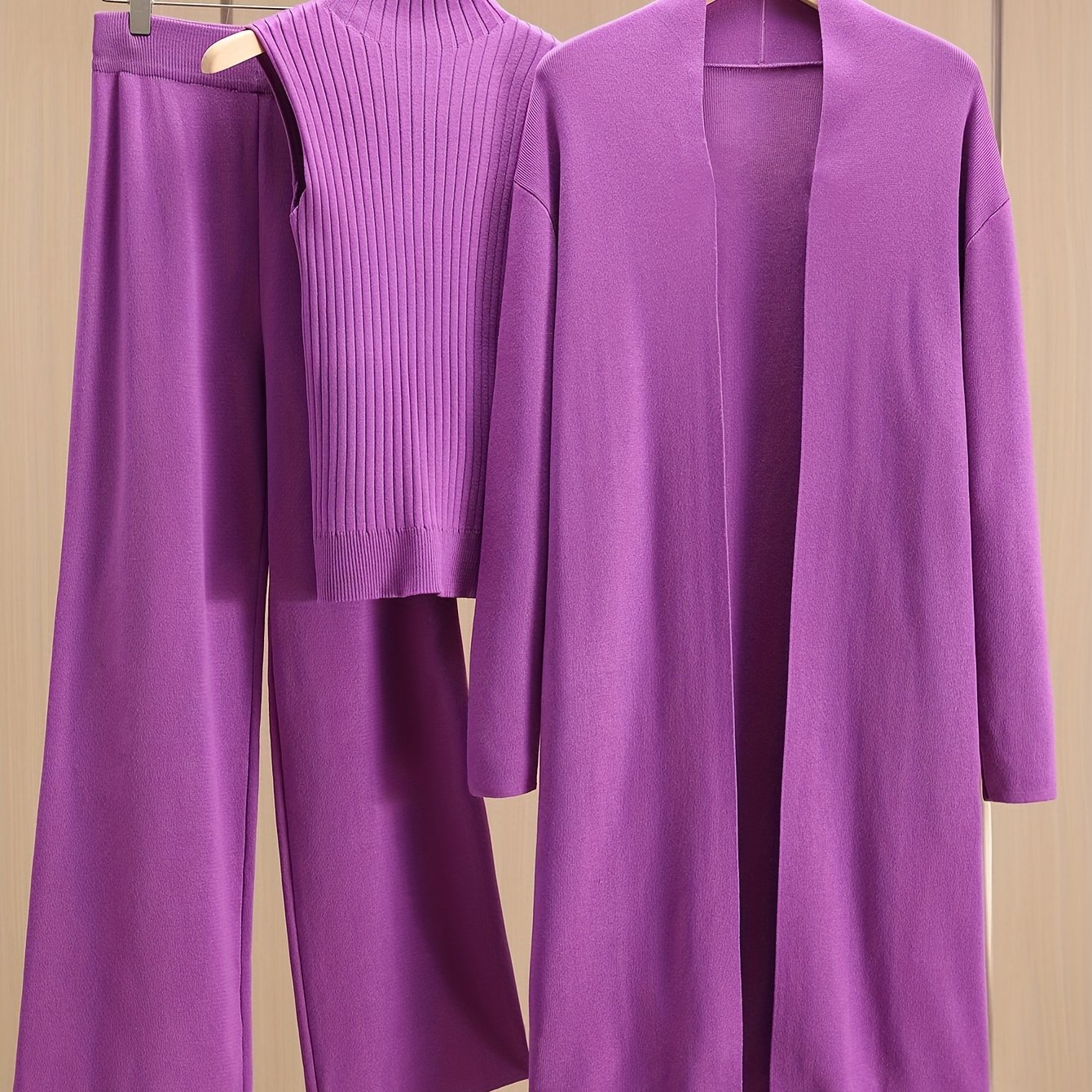 2024 women's three-piece knit set with wide-leg pants, cardigan, and turtleneck sweater.