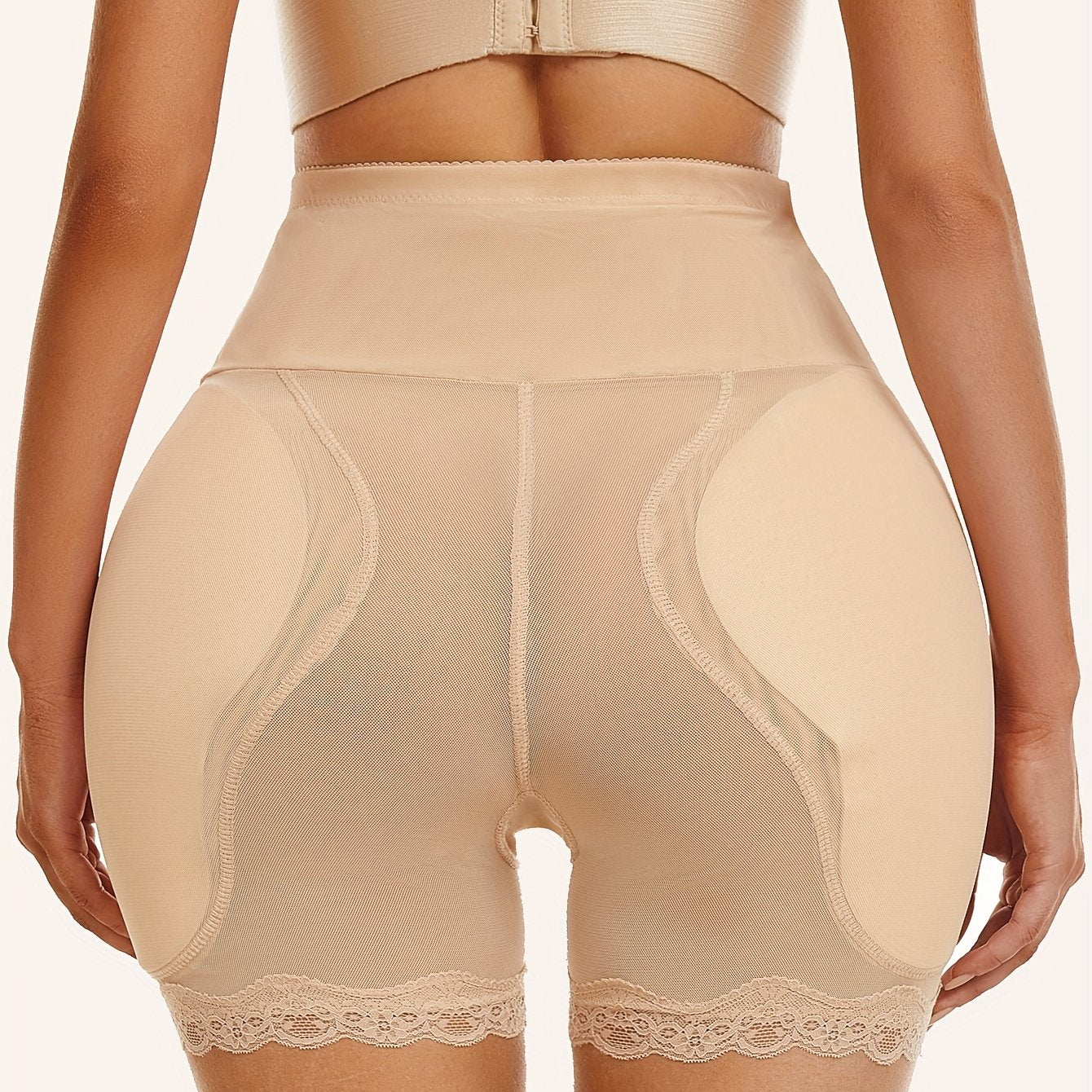 Mid-waist shaper panties with fake hip pads and mesh breathable tummy control for slimming waist and enhancing buttocks.