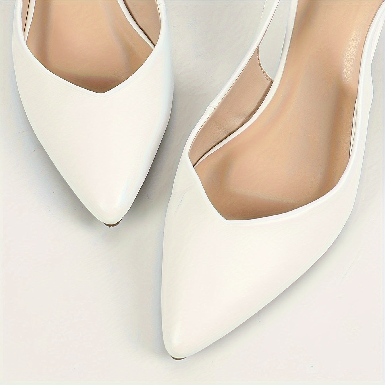 Chic and comfy pointed-toe kitten heel sandals for work.