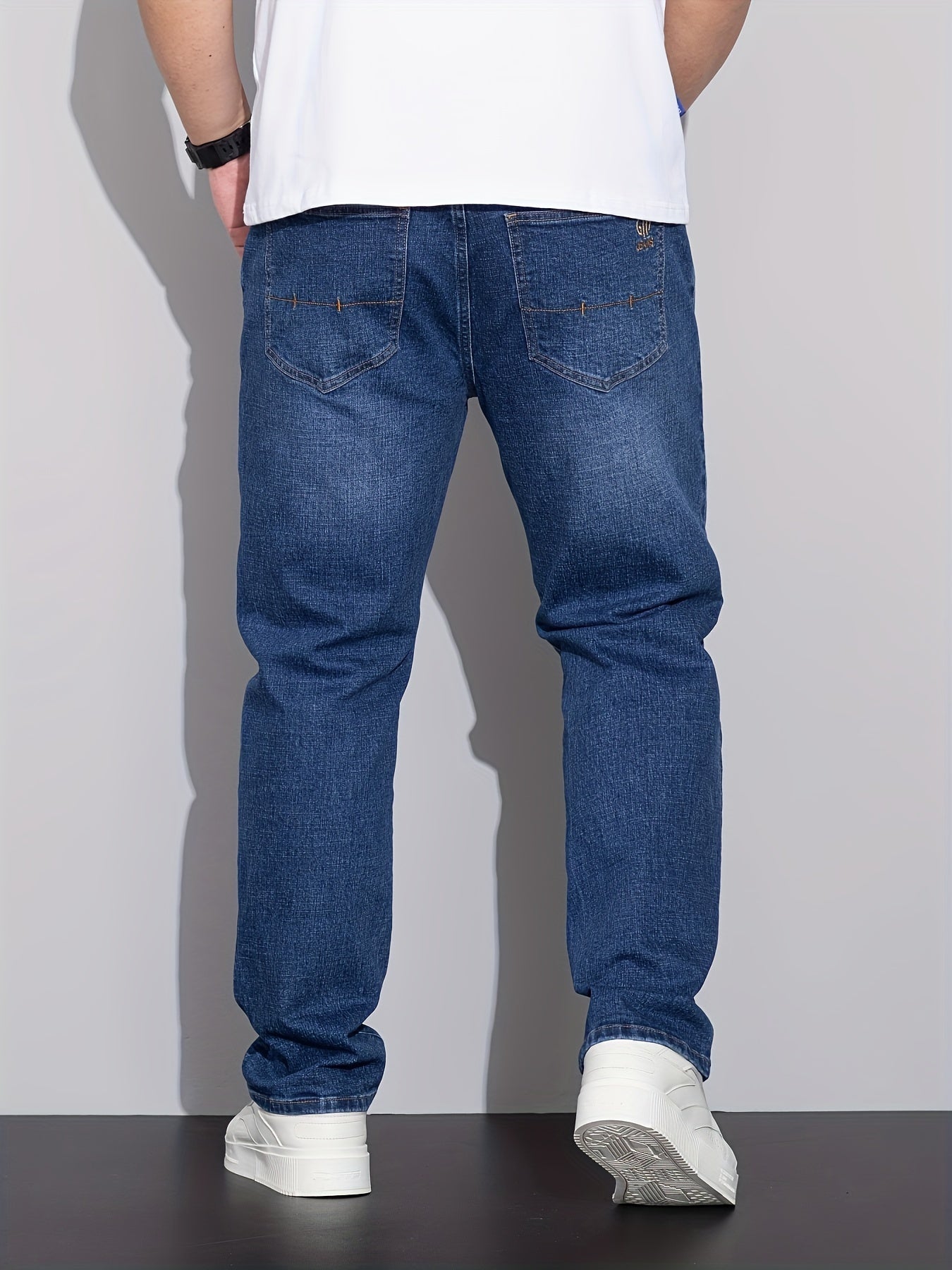 Comfortable stretch denim jeans for plus size men with versatile business style, straight-leg, and machine washable