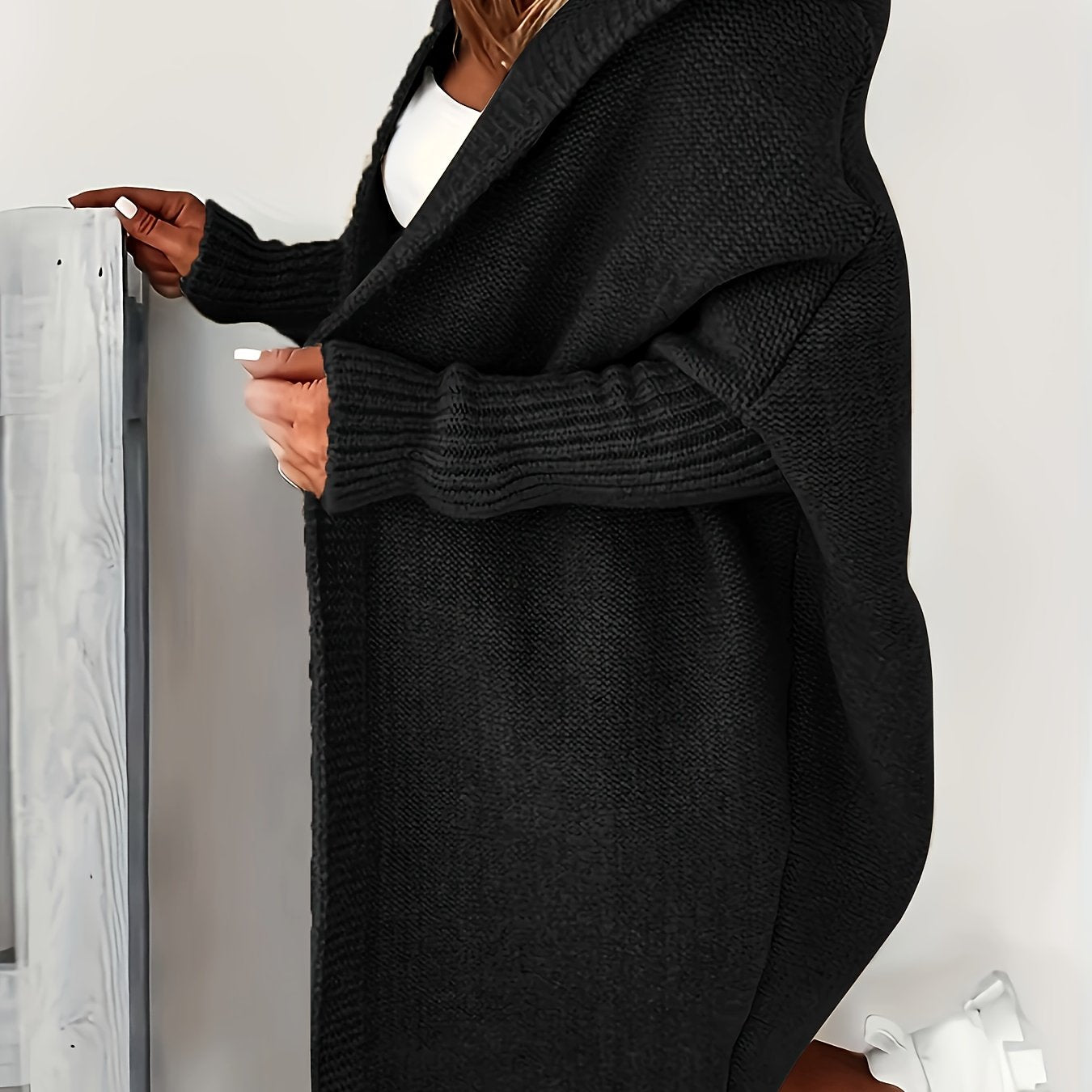 Plus size cozy gray cardigan with batwing sleeves, perfect for spring/fall. Made of easy-care polyester.