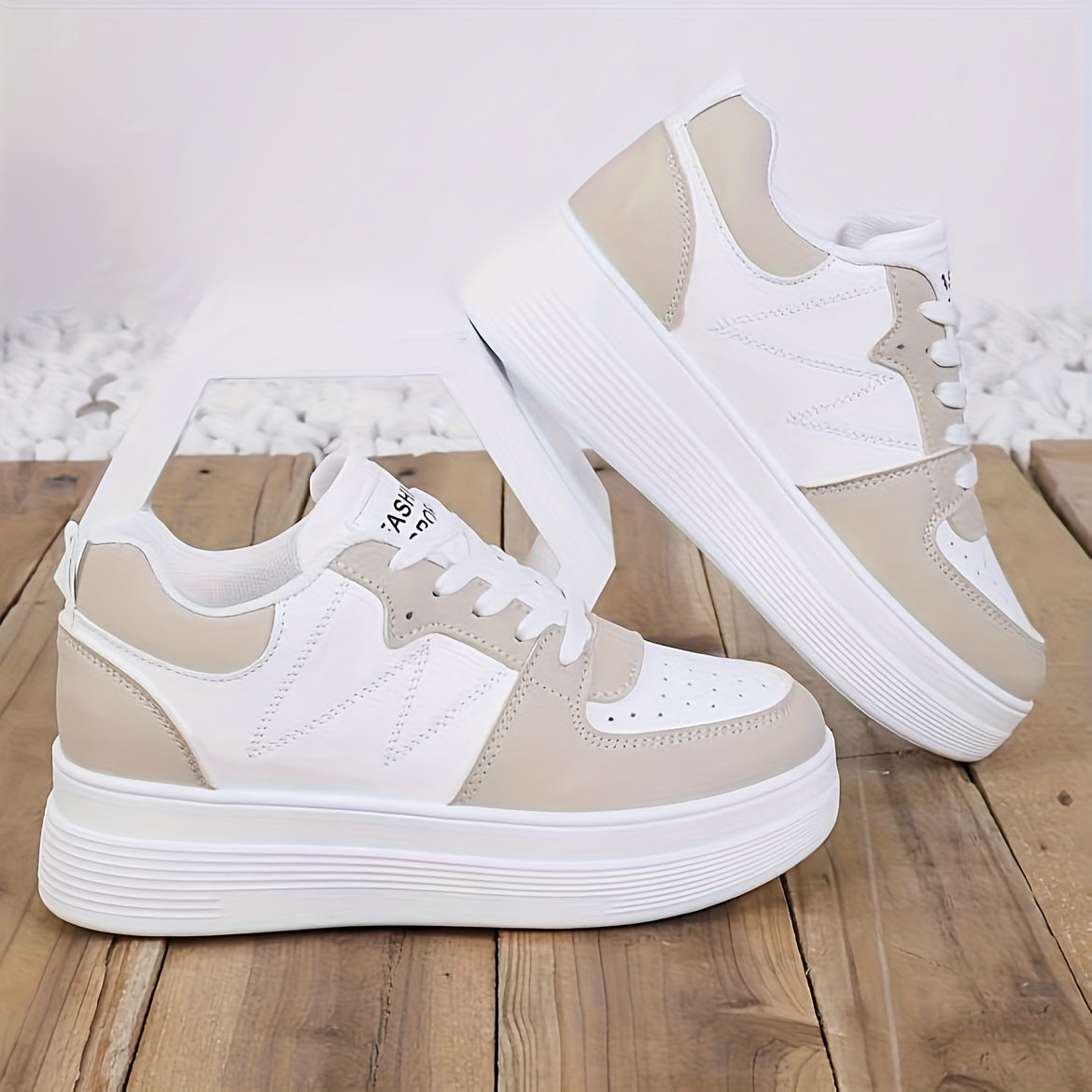 White & beige lace-up sneakers for women with synthetic cover, thick rubber sole, round toe design, and all-season comfort. Perfect for casual running and everyday wear. Trendy and