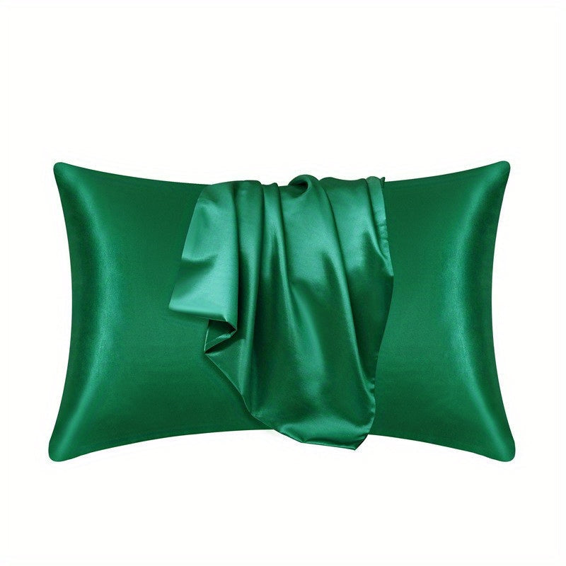 1 set of Satin Pillow Cases in a Solid Color, made with Silky Soft and Breathable material. These Pillowcases feature an Envelope Closure for a smooth and luxurious feel. Perfect for use in the Living Room, Bedroom, or Hotel, these Pillow Covers do not