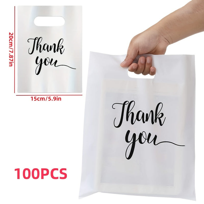 Stylish reusable plastic tote bags, ideal for retail, boutique, gifts, clothing & party favors, with elegant thank you text in black, white, and pink with golden cursive.