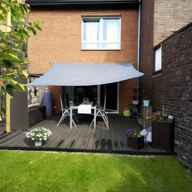 Waterproof rectangular sunshade sail for patio and garden made of durable polyester blend.