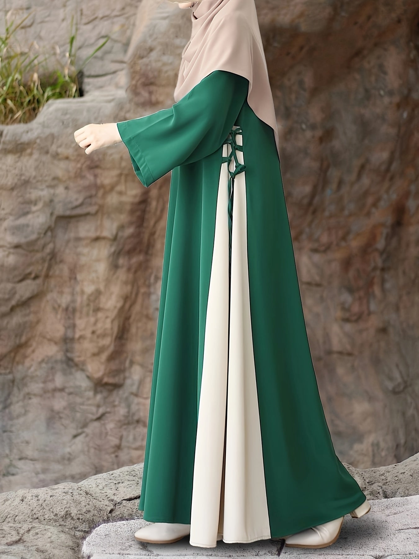 Kaftan dress with color block lace-up sides, loose fit, and long sleeves, without headscarf.