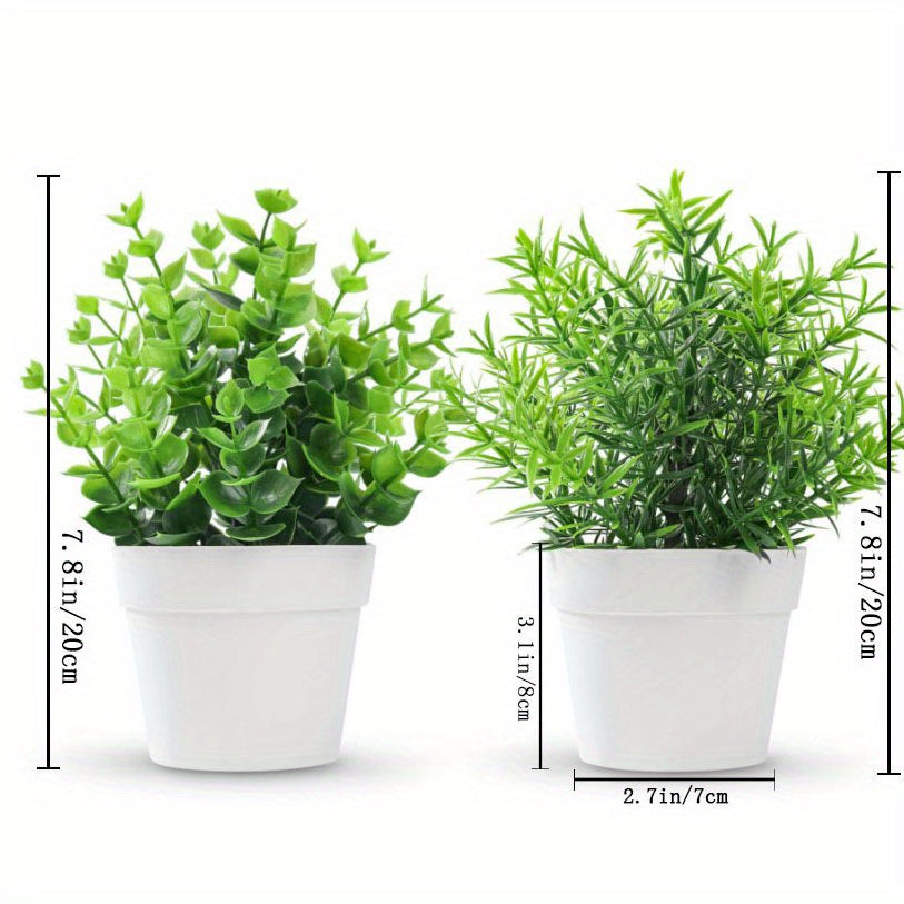 2 artificial mini potted plants with green eucalyptus leaves for summer home or desk decor.