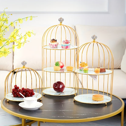 Golden cast iron birdcage cake stand for elegant dessert display in living room, perfect for snacks, fruit, and sweets.