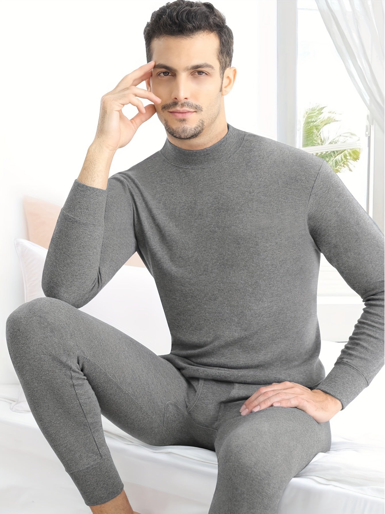 Men's multicolored mid-collared thermal underwear set for warm autumn and winter, including pants and long-sleeved pajama top.