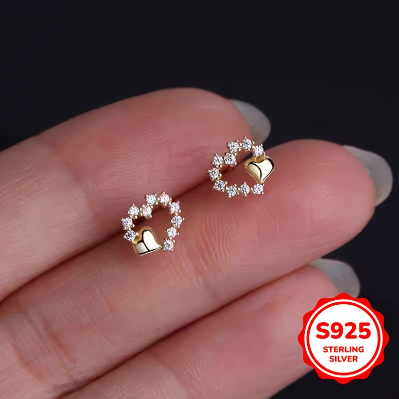 These graceful heart-shaped earrings are crafted from S925 silver with synthetic zirconia stones. Their simple and minimalist design is perfect for girls who prefer a cool and elegant style. These versatile earrings make a great gift for birthdays or