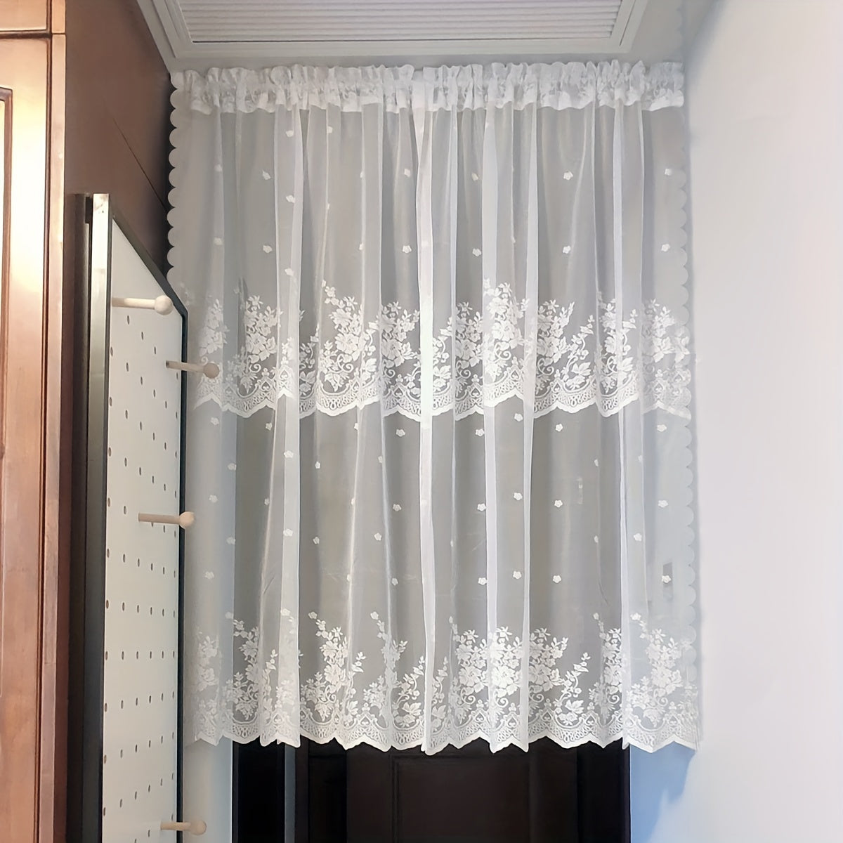 One piece of Romantic White Lace Curtain Panel, with adjustable length and machine washable. Featuring a delicate floral pattern, perfect for adding a touch of elegance to your bedroom, kitchen, or coffee shop decor.