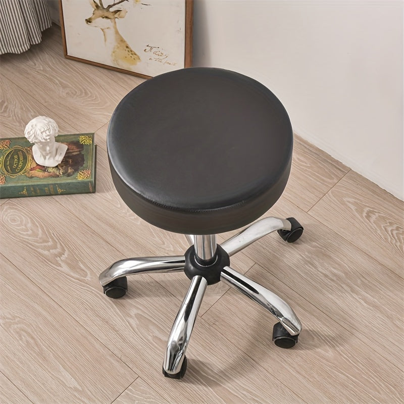 Waterproof faux leather stool cover in black, red, and brown. Elastic fit for various settings. Machine washable.