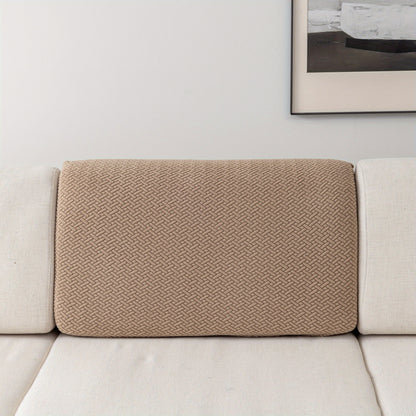 Modern gray sofa cushion cover with elastic fit and soft textured fabric. Machine washable for enhanced comfort in the living room.