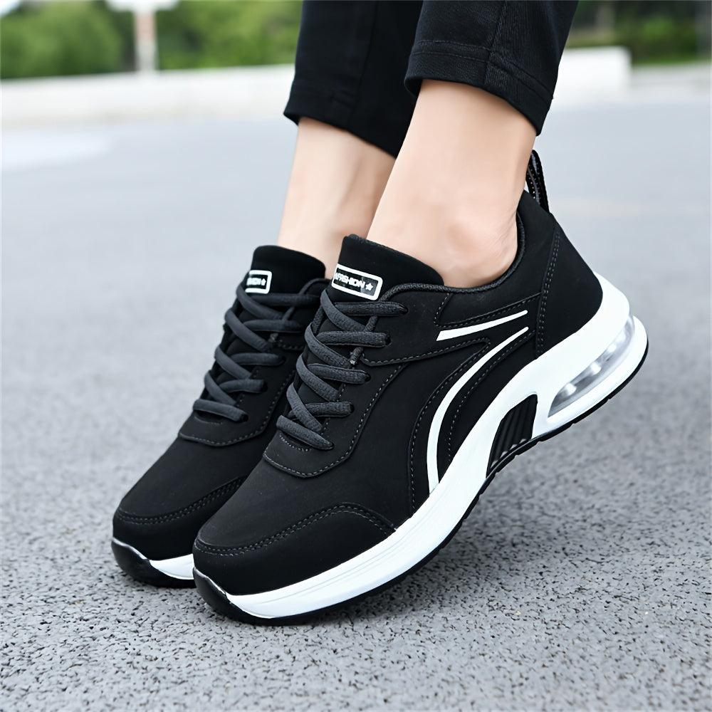 Women's casual sneakers made from black synthetic leather, featuring a lightweight design, air cushion support, lace-up style suitable for work, travel, or sports. Stylish and breathable