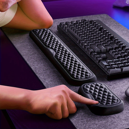 Ergonomic keyboard and mouse wrist rests for comfortable typing and mousing.