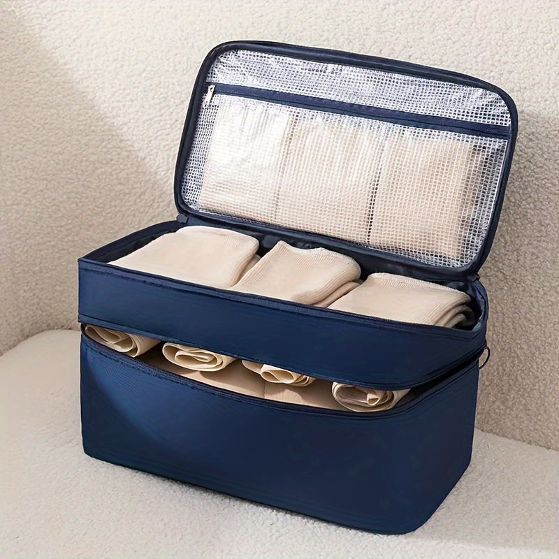 Travel underwear and bra organizer bag with double-layer design and divided compartments. Made of beige polyester fabric with a mesh interior. Ideal for dorms, trips, and daily use. Hand