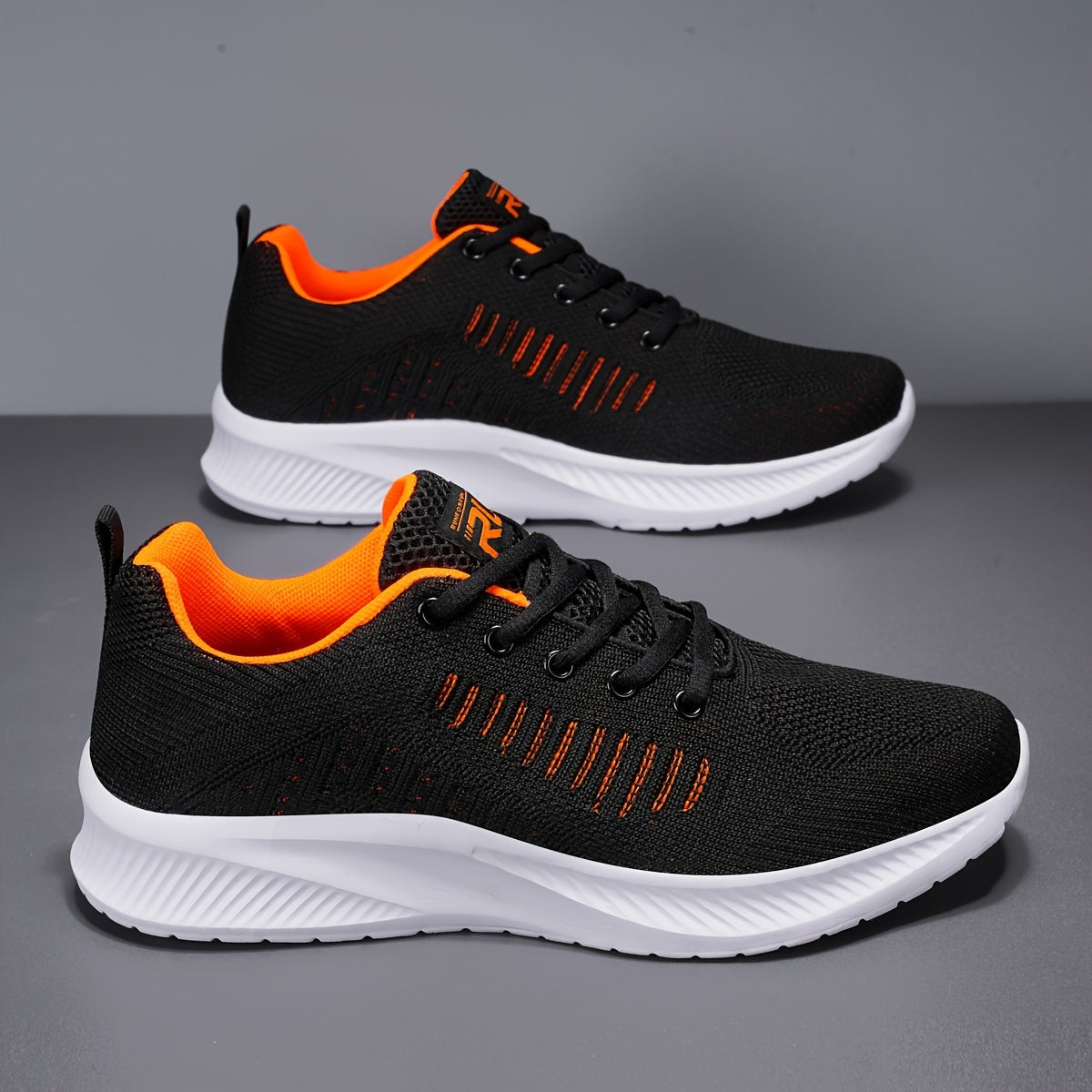 Men's lightweight and breathable lace-up sports shoes for road running, fitness, and casual wear.