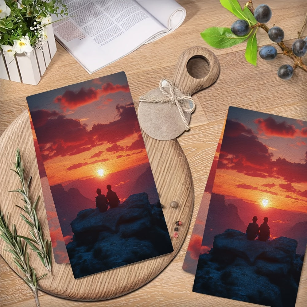 This duo of ultra-soft kitchen towels showcases two charming characters relaxing on a heart-shaped rock as they watch a beautiful sunset. These highly absorbent dish towels are ideal for adding a festive touch to your home decor, and are conveniently