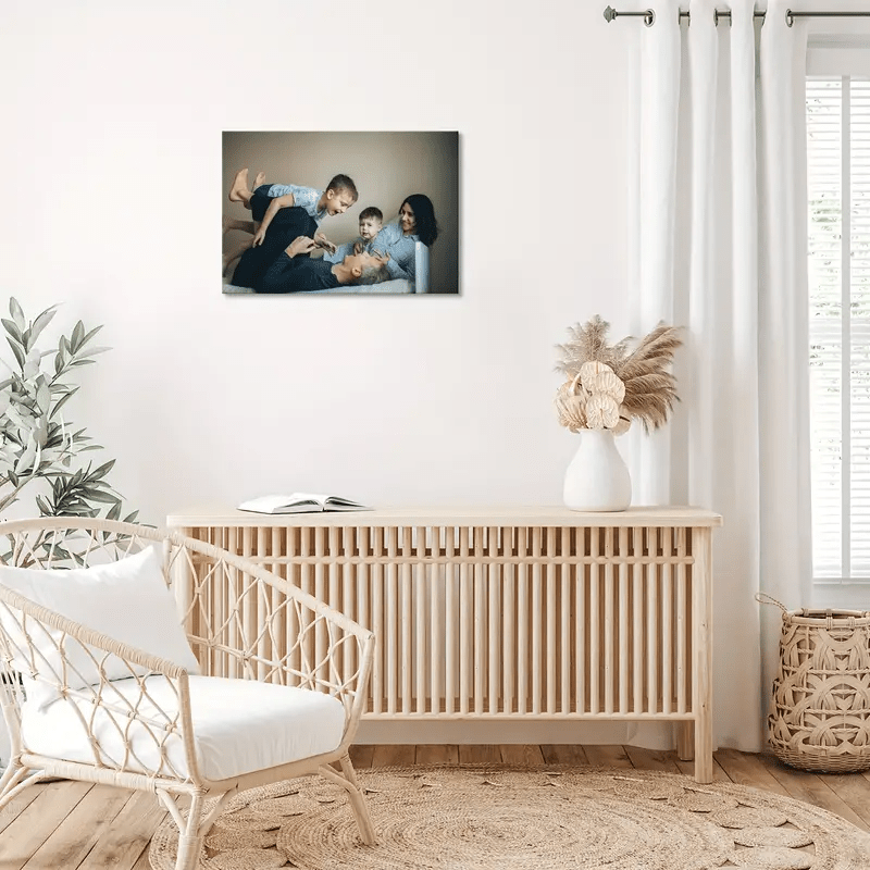 Custom photo canvas framed in pine wood; ideal gift for loved ones.