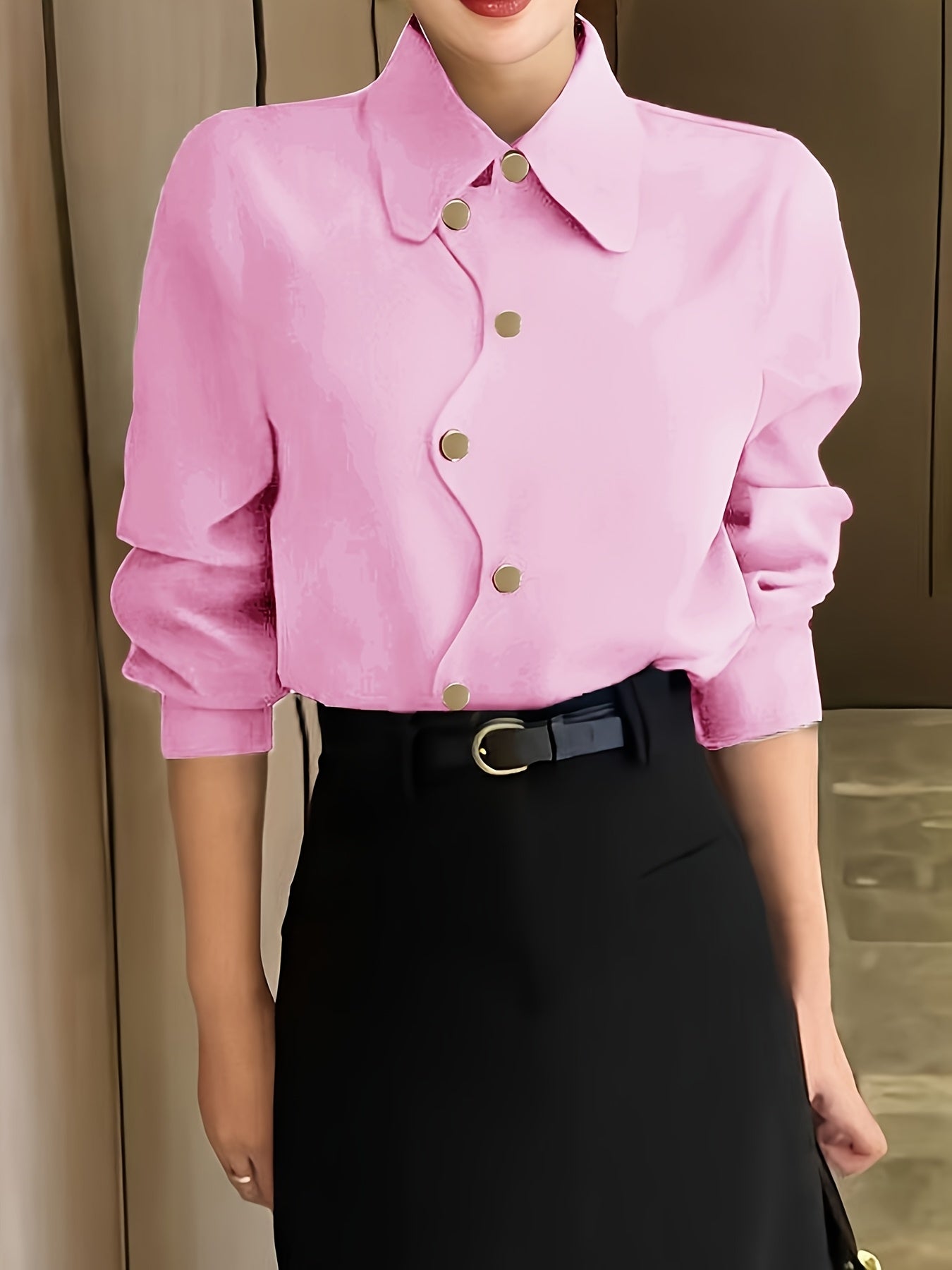 Elegant women's yellow button-up shirt with chic lapel collar and asymmetrical hem, made of polyester fabric suitable for all seasons.