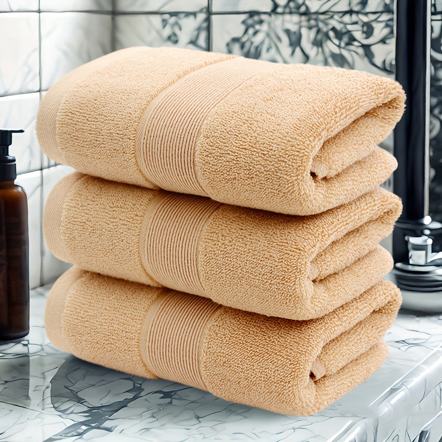 3 premium cotton velvet towels, 35.56cm x 73.66cm, soft & absorbent, hotel quality in dark blue, light beige, and gray. Ideal for bathroom or spa use.