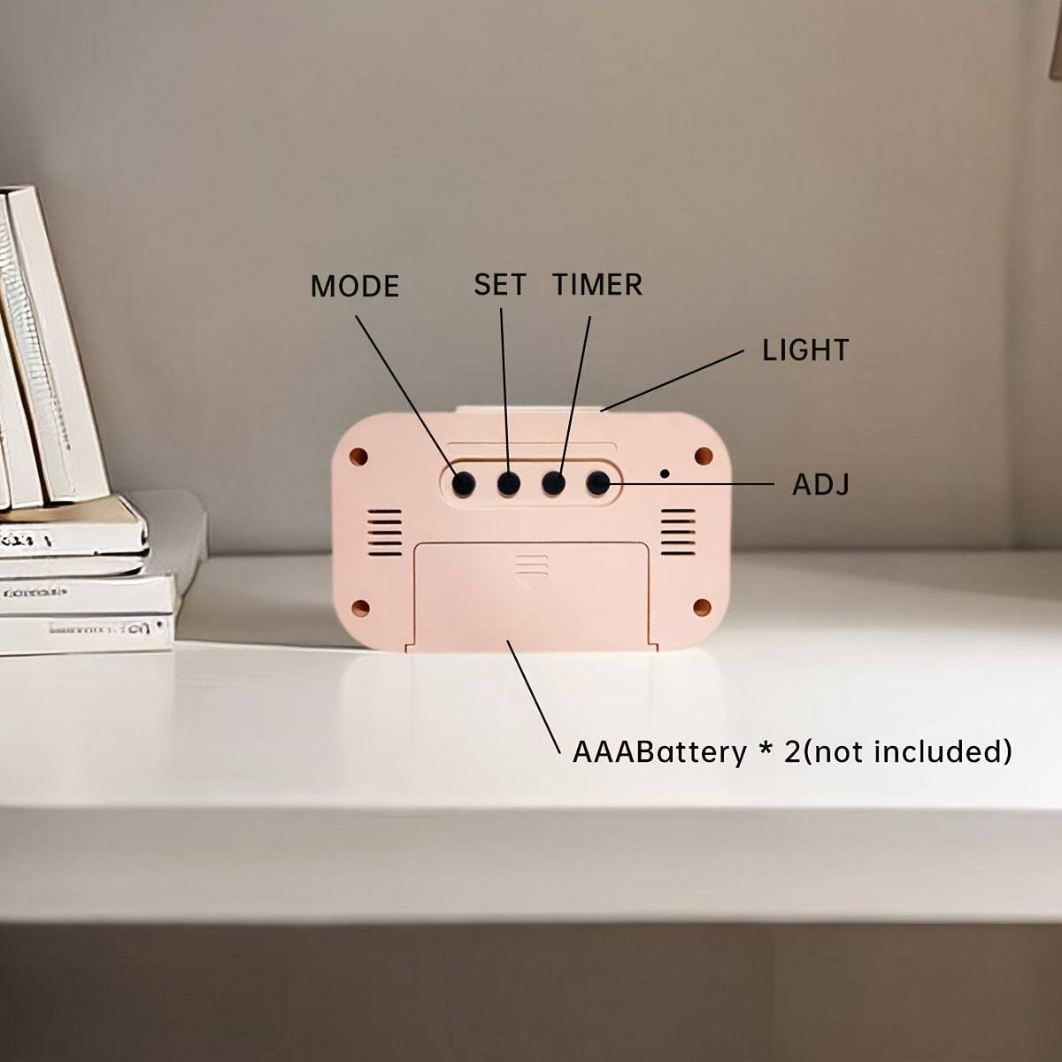 Compact pink mini LED desk clock with backlight, temperature, and calendar. Multifunctional kitchen timer for students. Sleek rectangular design with digital display. Battery-powered (AAA). Minimalist aesthetic.