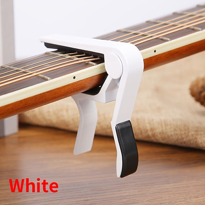 Aluminum alloy guitar capo for acoustic, classical, electric guitars and ukuleles, quick change with tone adjustment.